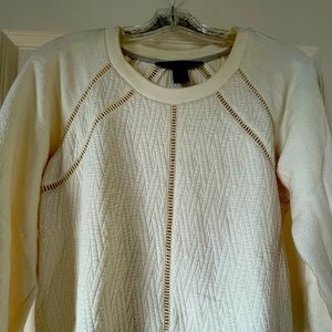 Marc by Marc Jacob’s cream colored pull over sweater with cute cut outs.